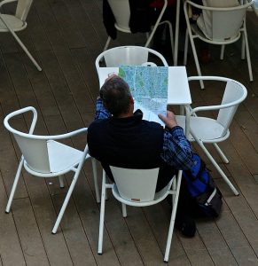 Tourist reading a Lisbon Map